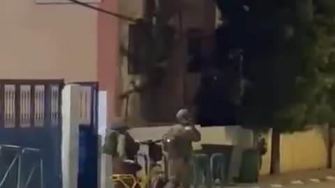Israeli occupation soldiers steal a bike during a raid