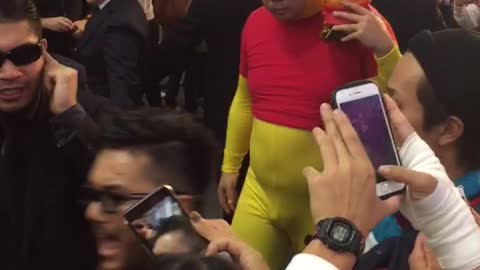Pooh, Paparazzi and Body Guards Walk Through Tokyo