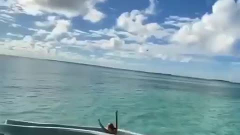 Girl Take Water Slide Into The Ocean