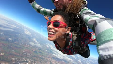 Beautiful Brazilian afro woman practicing skydiving