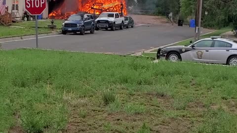 Firemen Rescue Dog from Fast-Spreading Fire