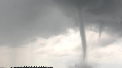Water Spouts Touch Down Between Islands
