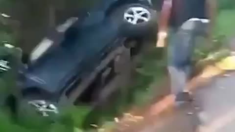 trying to save a car from rolling down the mountain failed