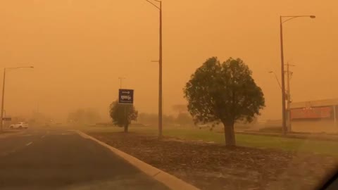 Yellow haze from dust storm completely envelopes city in Australia