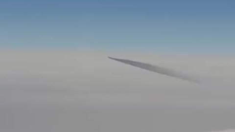 Passenger spots a strange moving UFO mid-flight