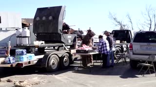 Mayfield residents claw through debris after twisters