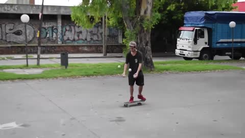 Skater Hardflips While Juggling Four Balls