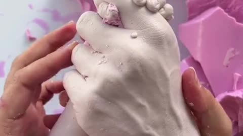 Baby hand satisfying video