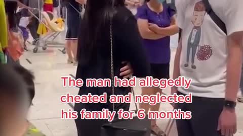 Woman catches husband returning to Singapore with another girl