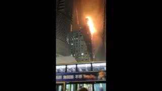 Hong Kong skyscraper goes up in flames