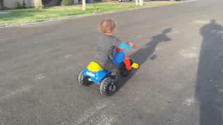 Baby Bryan Riding His Bike