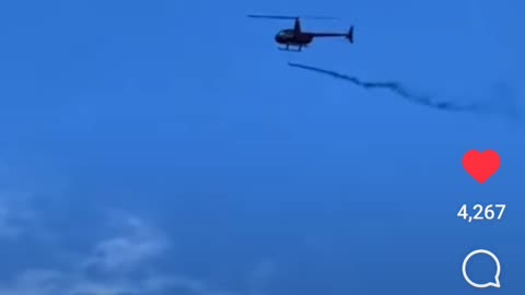 Helicopters Release GMO Mosquitoes Over The City