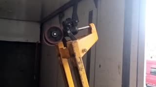 Pallet Wheel Gets Thoroughly Stuck in the Ceiling