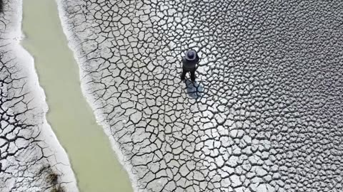 Shrinking lake Titicaca rings climate alarm bell