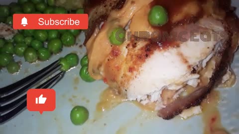 bacon wrapped cheese stuffed chicken breast with peas & onion cornbread