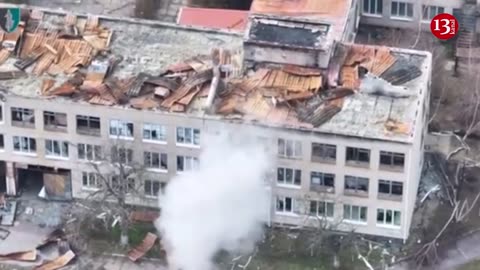 Image of Ukrainian kamikaze drones attacking building housing Russians in Kherson