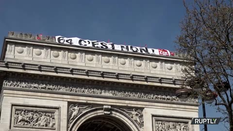 France: 'Can't be 64!'- Activists raise banners on Paris' Arc de Triomphe as protests continue