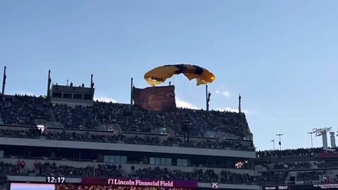Parachute landing in stadium