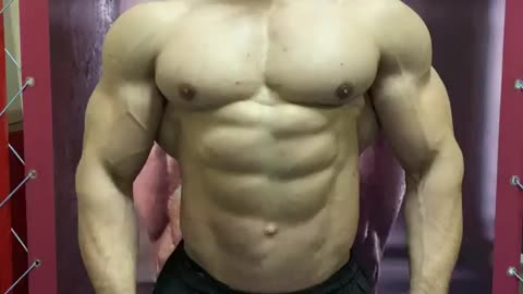 Bodybuilder flexing muscle