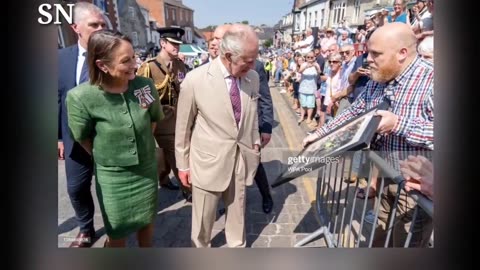 King Charles Gets Upstaged at Plaque Unveiling in Wales — by a Gust of Wind! See His Reaction