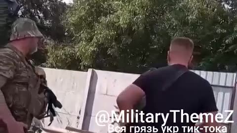 A shell-shocked employee of the Ukrainian military enlistment office