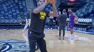 LeBron James, back on the court, taking free throws after shootaround in New Orleans