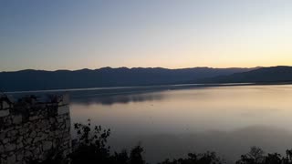 Beautiful sky above lake just before sunrise