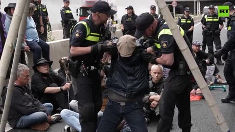IDIOTS - Extinction Rebellion protesters block highway in The Hague