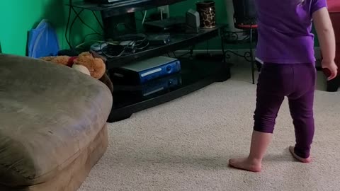 Child Watches Wiggles While Siblings Look On Upset