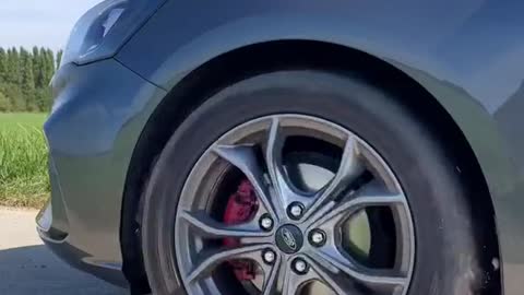 Automobile driving starts repairing tires