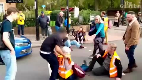 Motorists drag Just Stop Oil protesters off central London road