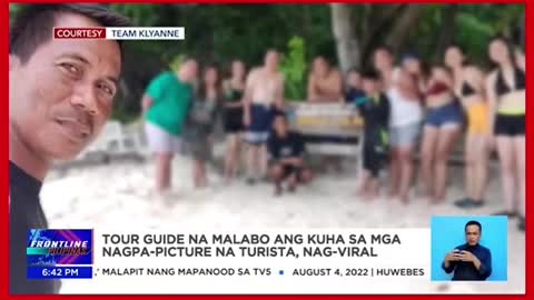 Tour guide na malabo ang kuha sa mga nagpapicture na turista, nagviral