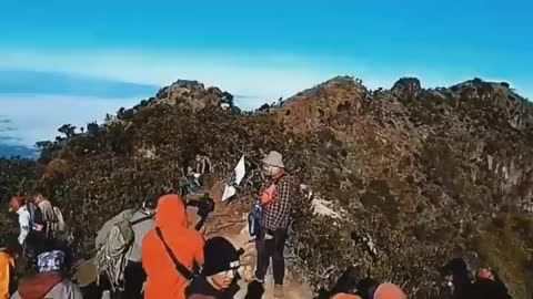 THE STRUGGLE TO REACH A MOUNTAIN TOP IN INDONESIA
