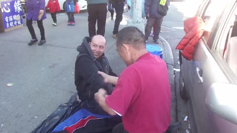 Luodong Massages Bald Chinese Man On Sidewalk