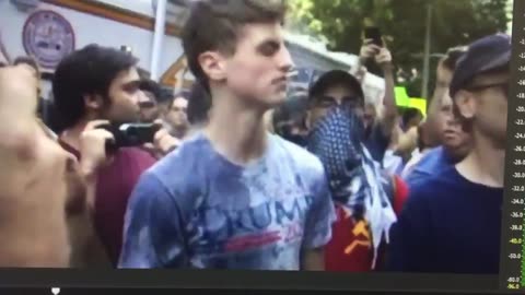 Aug 19 2017 Boston free speech rally 1.7 Antifa throw stuff at a trump supporter's head