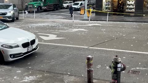 Big Ice Chunks Falling from Sky Nearly Hit Pedestrian