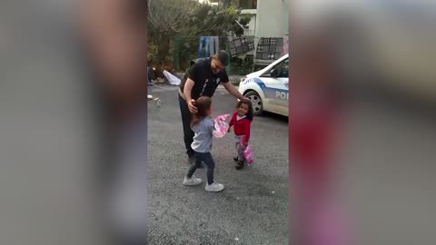 Policemen Gift Toys To Children Living In Affected Areas