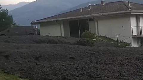 Massive mudslide hits small town in Switzerland...