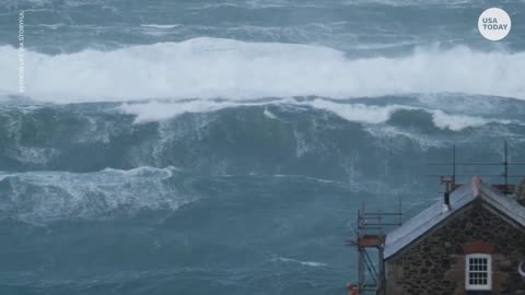 Stunning sight as colossal waves crash into coast in southern England | USA TODAY