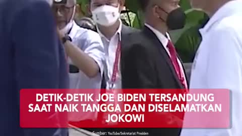 JOE BIDEN stumbled up the stairs and was rescued by jokowi