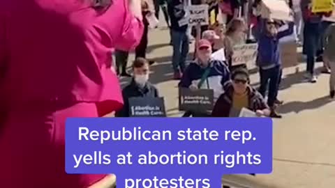 Republican state rep.yells at abortion rights protesters