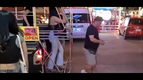 Thailand, Pattaya. Nightlife, beach road and sexy girls waiting for you.