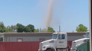 Large Dust Devil Spotted Outside Shop