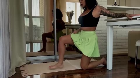 Beautiful woman practising yoga in the morning, looking healthy and fit