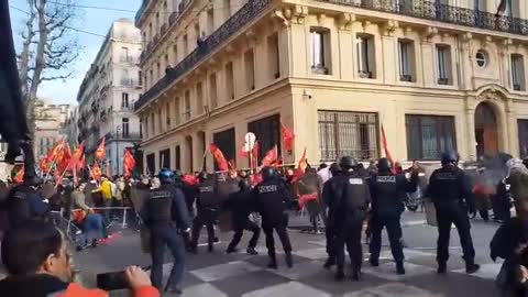 Kurds flying the flag of the Kurdish Workers Party (the PKK) rioting in Paris