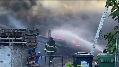 Firefighters battle 4th-alarm fire at Spiegel South Shore Scrap Metal Inc in Brockton