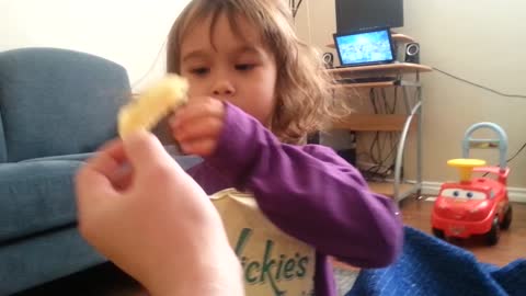 4 yrs old's first time eating salt and vinegar chips.