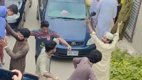 Boys dancing in street