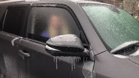 Breaks Formulated Ice on Car’s Window With Her Head From Inside the Car