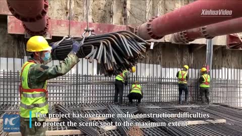 Bottom slab casting of tunnel across iconic scenic spot in E China completed